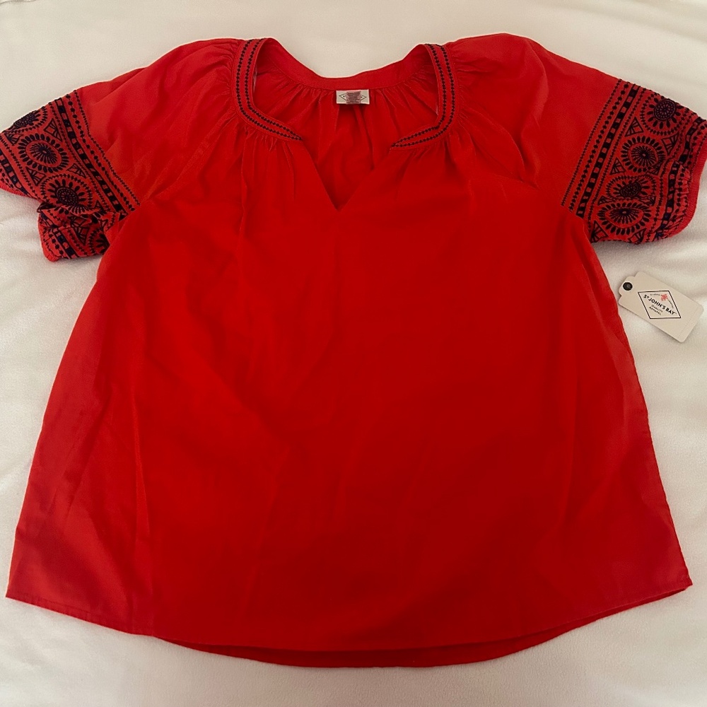 Red shirt with black accents